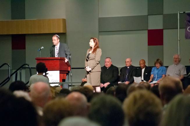 Rabbi Malcolm Cohen and Cantor Mariana Gindlin, from Temple Sinai of Las Vegas, make a few remarks before singing "Eili, Eili" during an interfaith gathering to address community and family concerns, May 22, 2012. Members of local Christian, Jewish and Muslims organizations, along with other charitable and non-profit groups, addressed issues such as children's safety, foreclosures, immigration, and education.